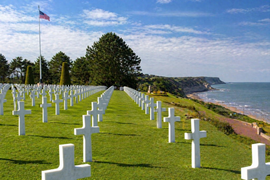 Best places to visit in France — Normandy American Cemetery at Omaha Beach with rows of white crosses overlooking the sea