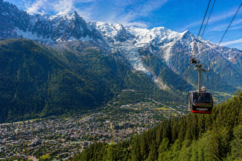 Top 10 beautiful places in France — Chamonix valley with Mont Blanc massif and alpine village in foreground
