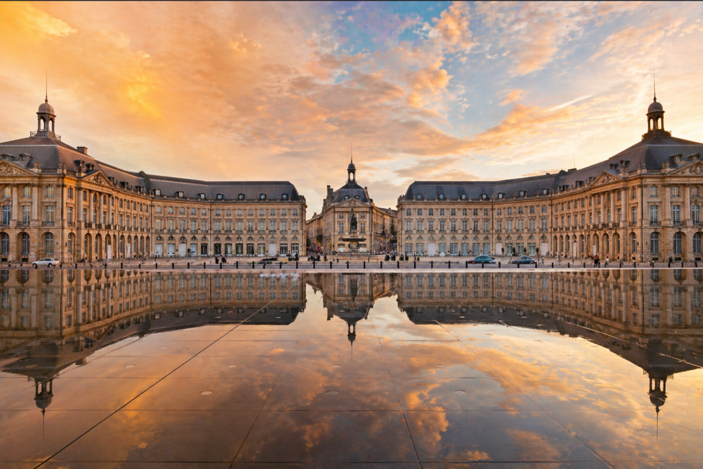 Best places to go in France — Bordeaux Place de la Bourse reflected in the famous Miroir d'Eau water mirror